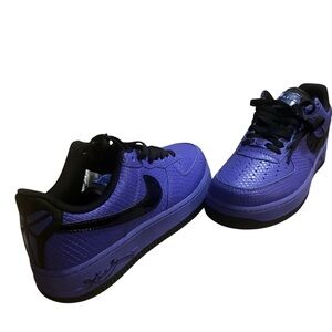 Purple Kids Athletic Sneakers with Black Swoosh